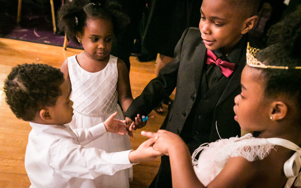 Little kids dancing together at a Glen Terrace wedding
