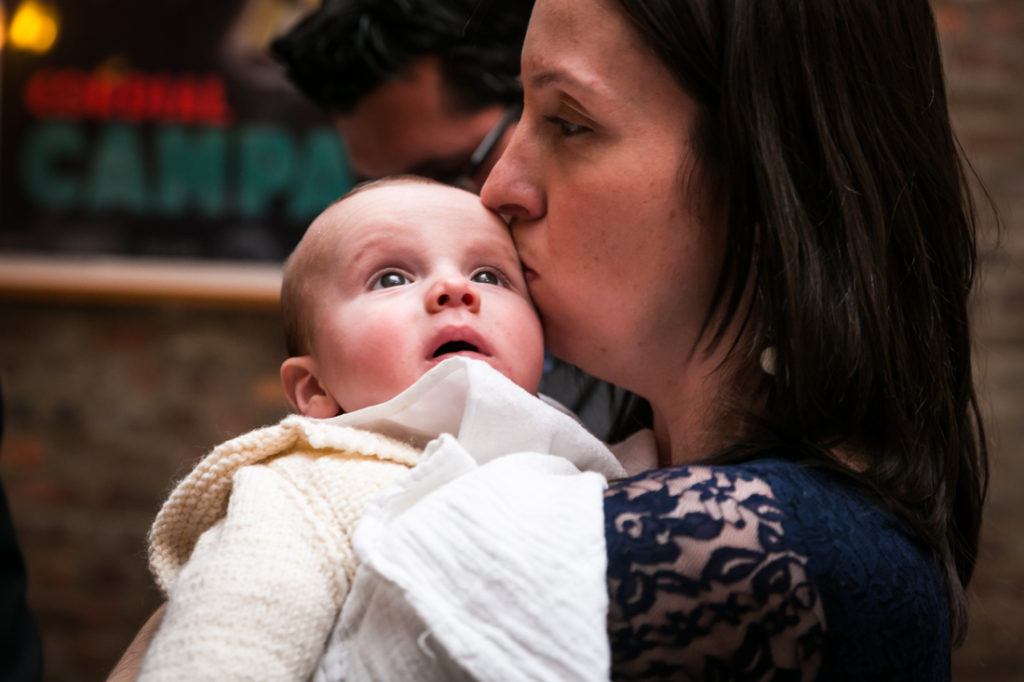 Guest and baby waiting for a Scottadito wedding