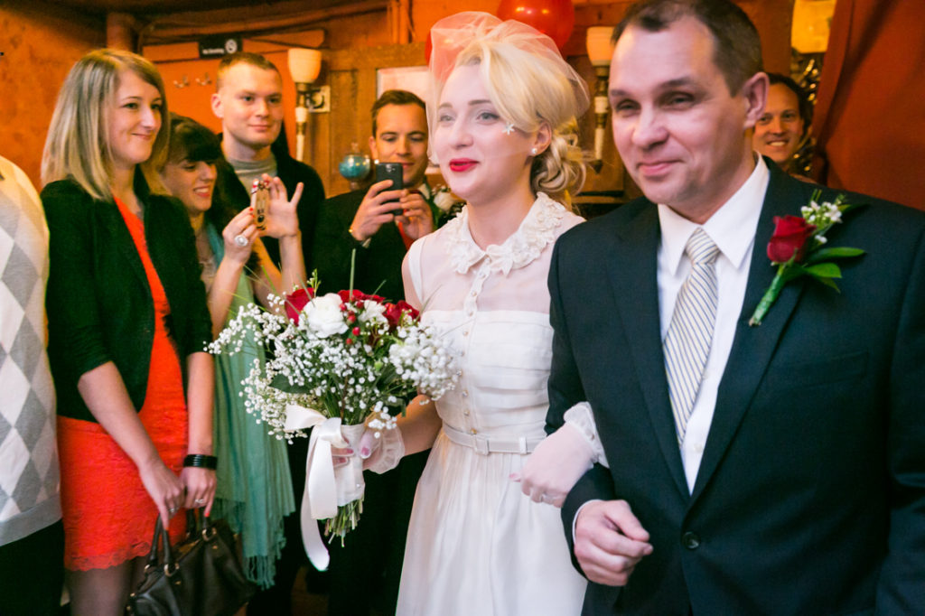 Walking down the aisle at a Scottadito wedding