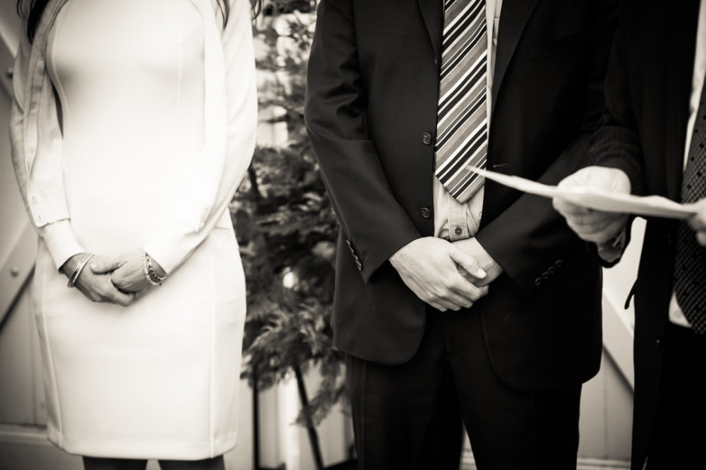 Hands of the bride and groom for an article on the top fears about wedding photographers