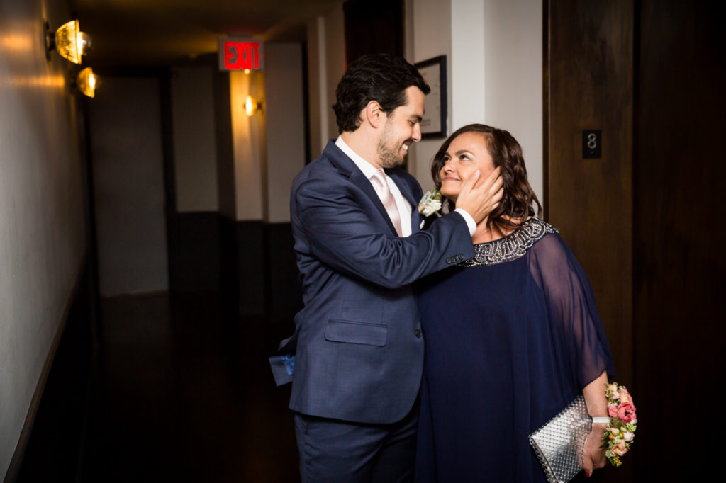 Groom and mother before a Wythe Hotel wedding