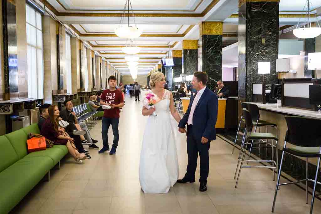 Couple leaving after their NYC City Hall elopement