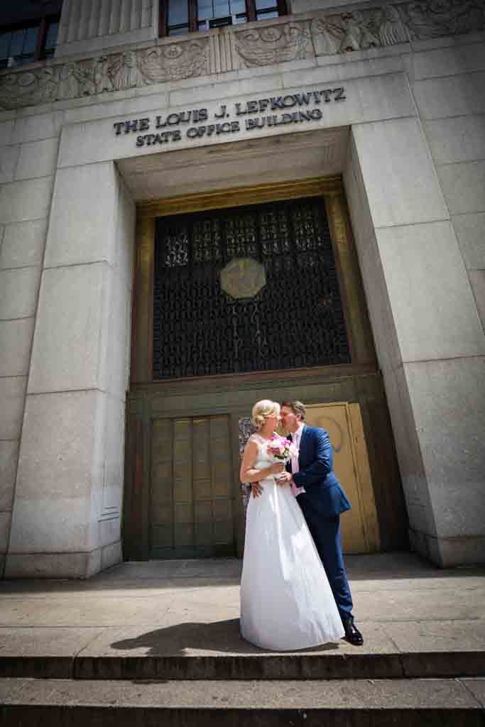 Couple leaving after their NYC City Hall elopement
