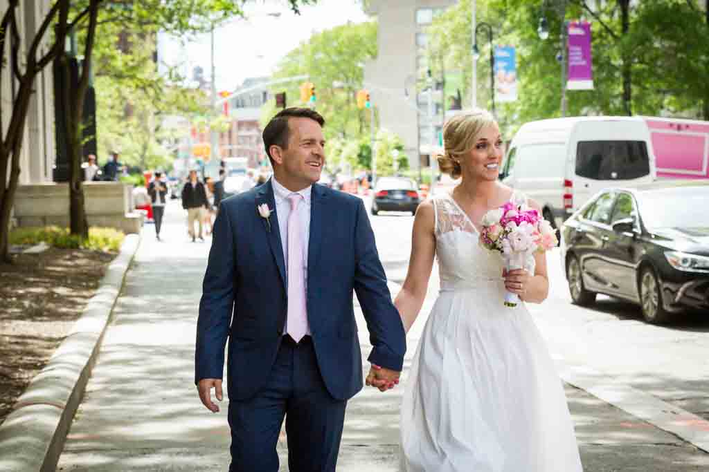 Couple leaving after their NYC City Hall elopement