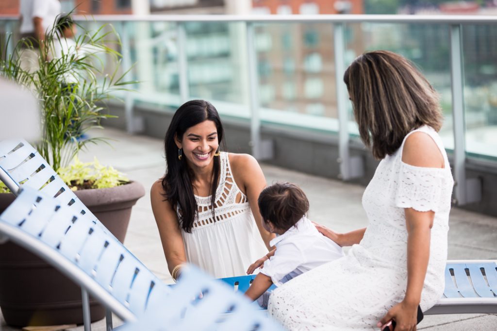 Guests at a nontraditional baby shower