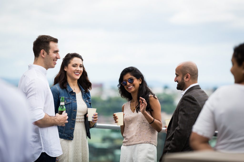 Guests at a nontraditional baby shower