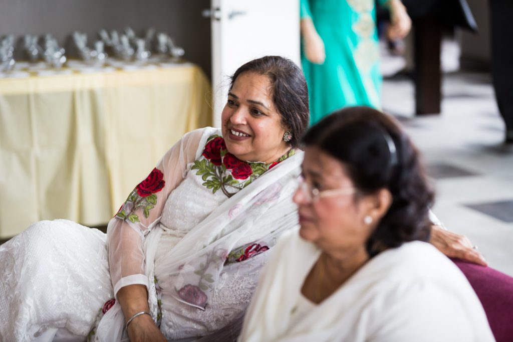 Guests at a nontraditional baby shower