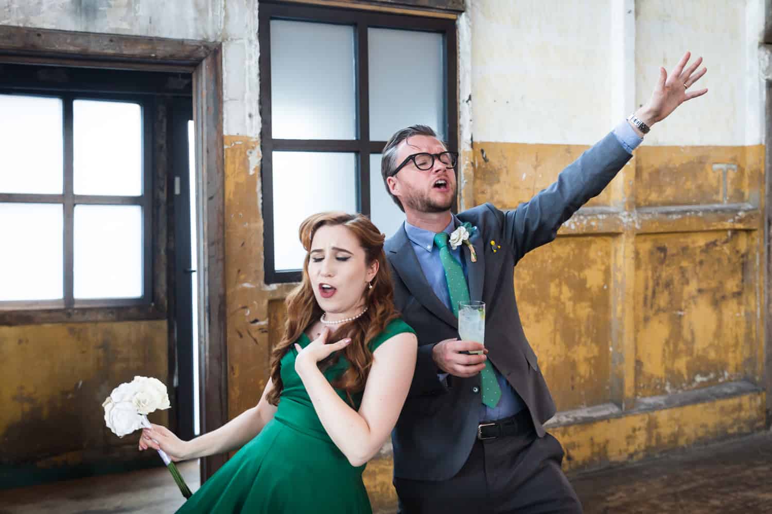 Couple singing dramatically at a Greenpoint Loft wedding