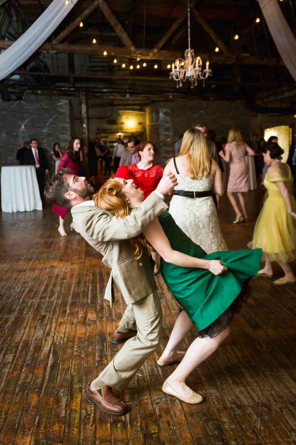 Couple dancing dramatically at a Greenpoint Loft wedding