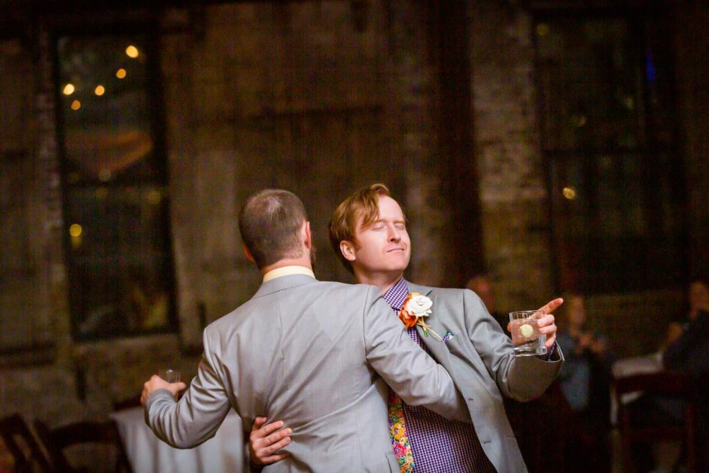 Groom and man dancing at a Greenpoint Loft wedding