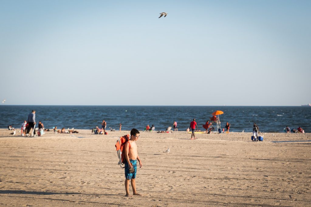 Kid on the beach at Coney Island