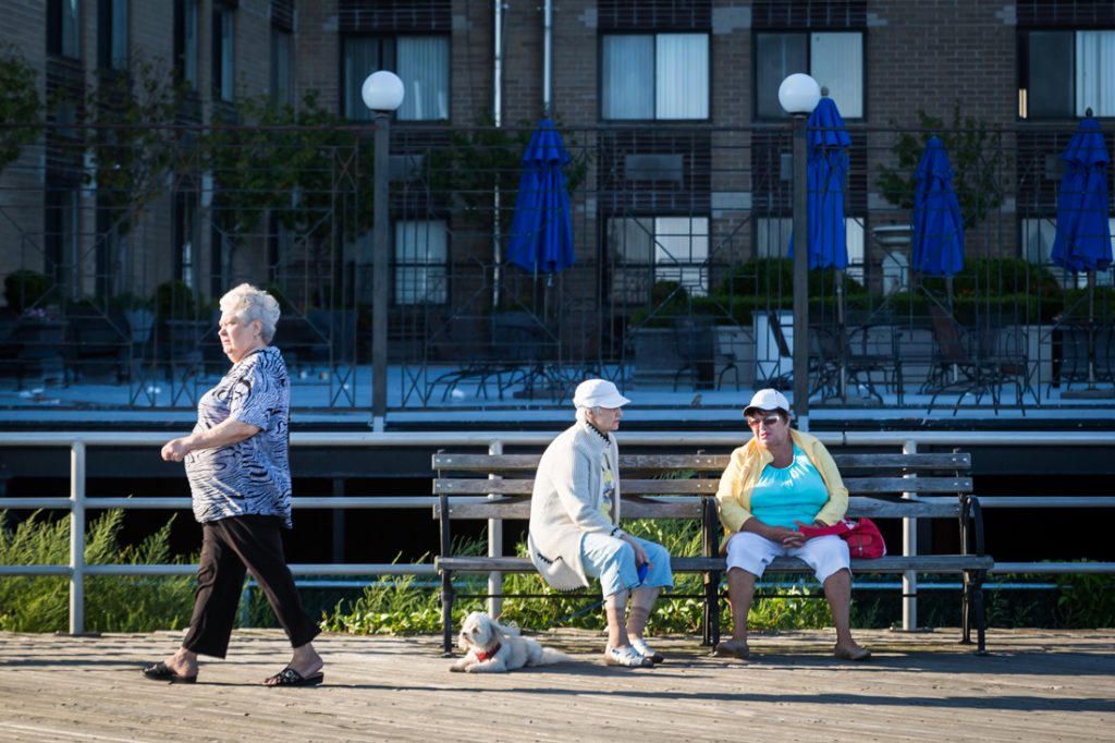 Three older women on the Coney Island boardwalk