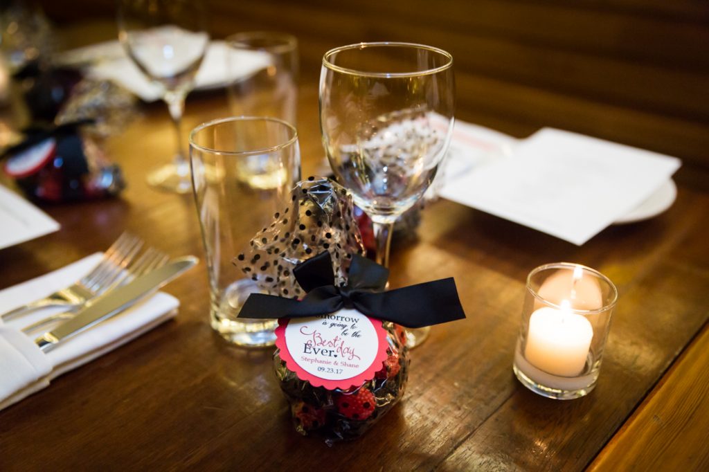 Place setting at a rehearsal dinner for an article on details your wedding photographer needs to know