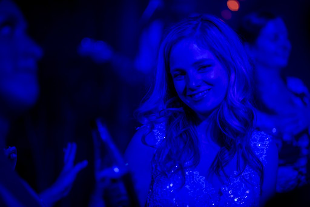 Bride in blue dancing at an after party at the Heath