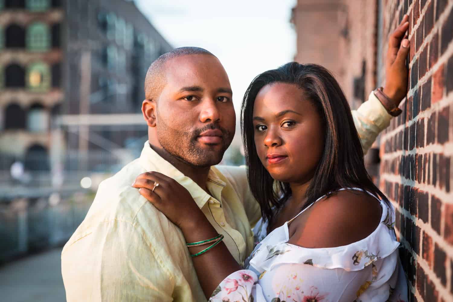African American couple hugging during Red Hook engagement shoot