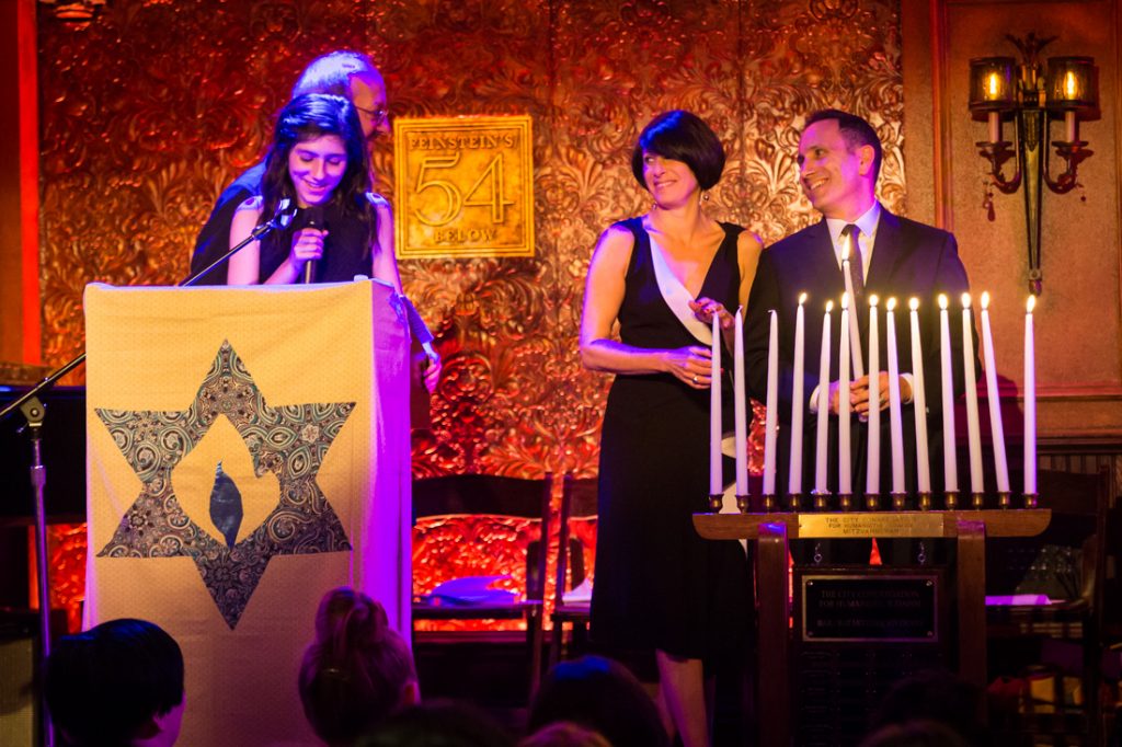 Candle lighting ceremony at a bat mitzvah for an article on ‘How to Find a Venue’