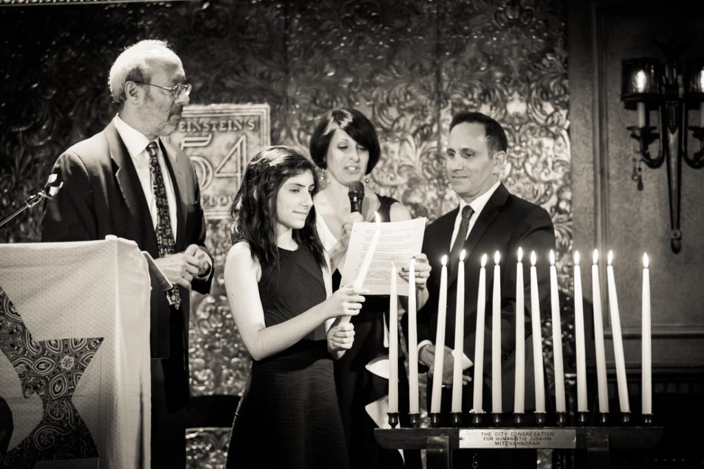 Candle lighting ceremony at a bat mitzvah for an article on ‘How to Find a Venue’