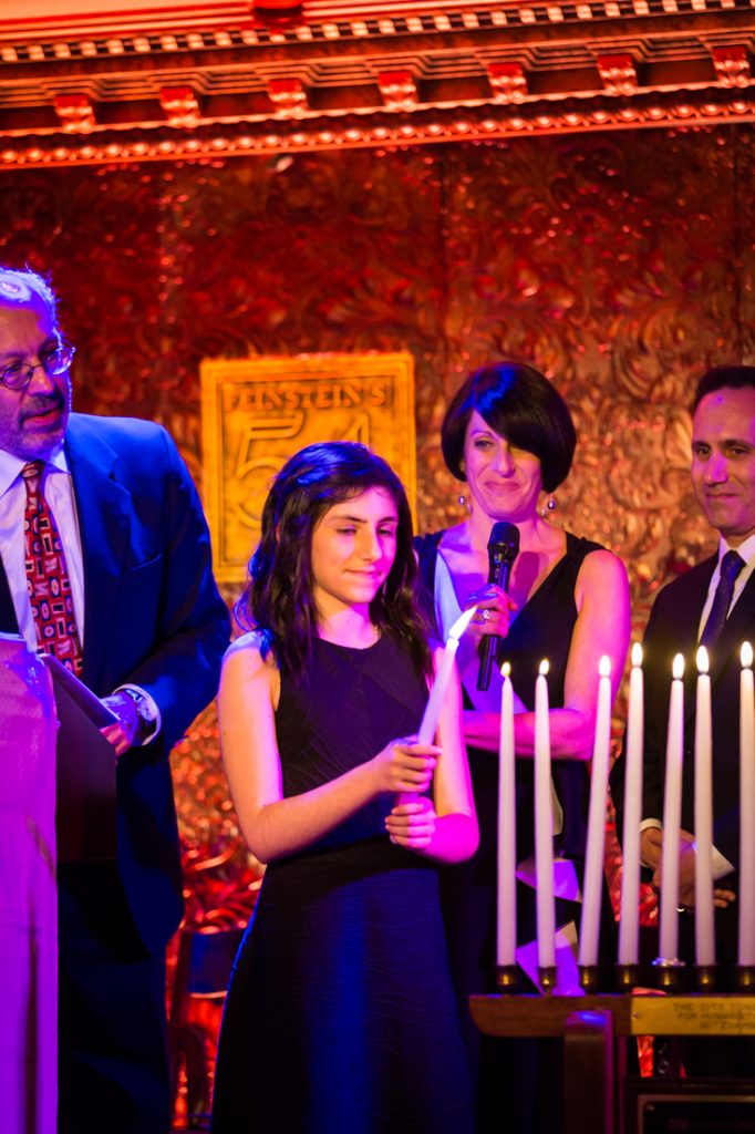Candle lighting ceremony at a bat mitzvah for an article on ‘How to Find a Venue’
