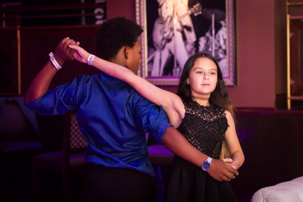Kids dancing at a bat mitzvah for an article on ‘How to Find a Venue’
