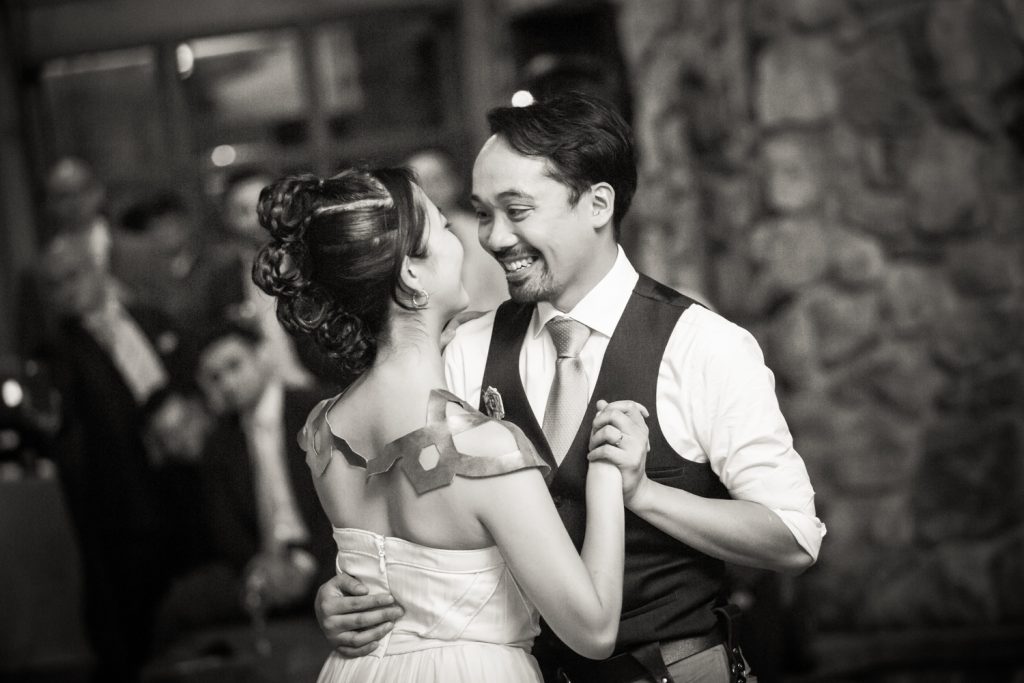 Black and white photo of bride and groom during first dance at a Bear Mountain Inn wedding