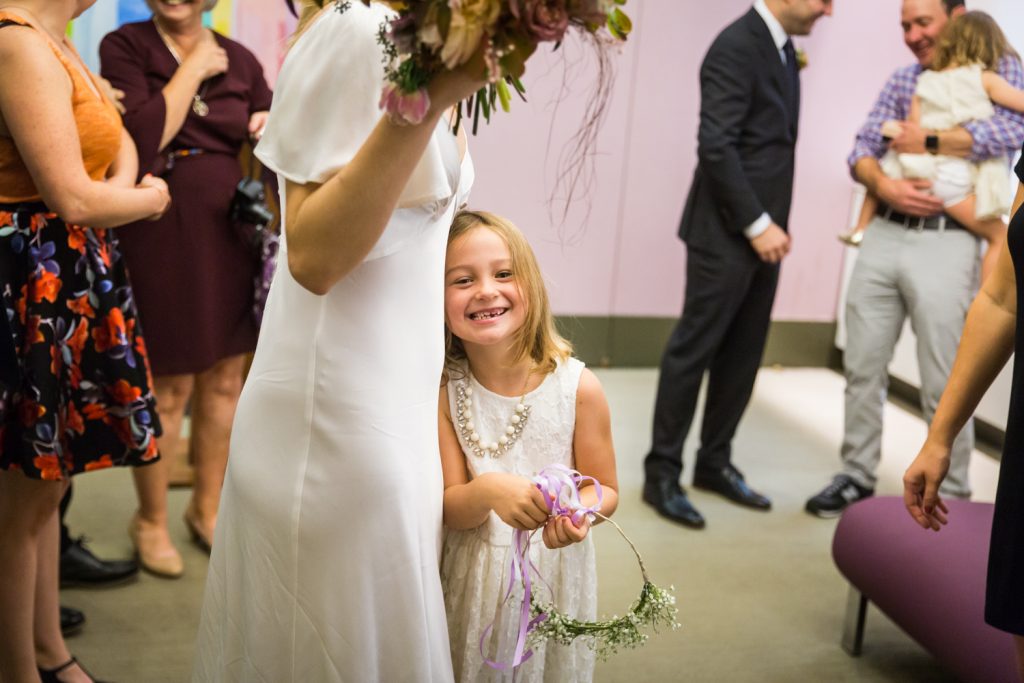 Bride and flower girl for an article on How to Get Married at City Hall in Any NYC Borough