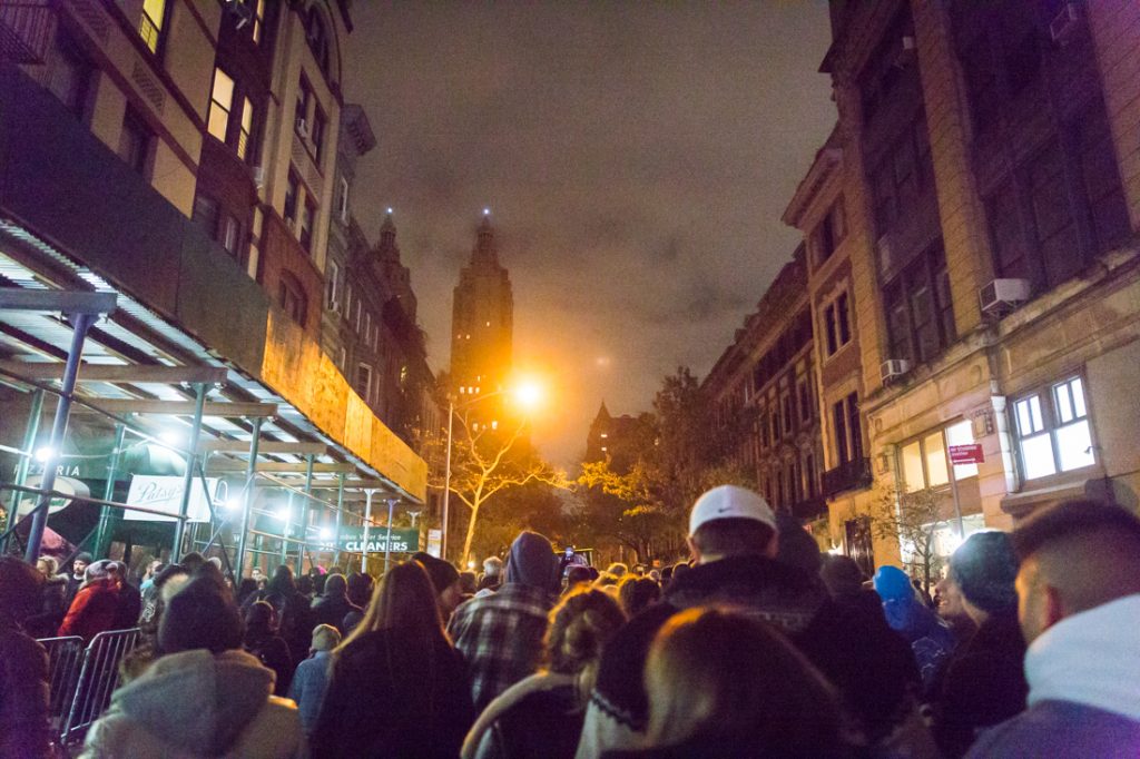 Crowds waiting to see balloons being inflated at the NYC Thanksgiving Parade Inflation Celebration