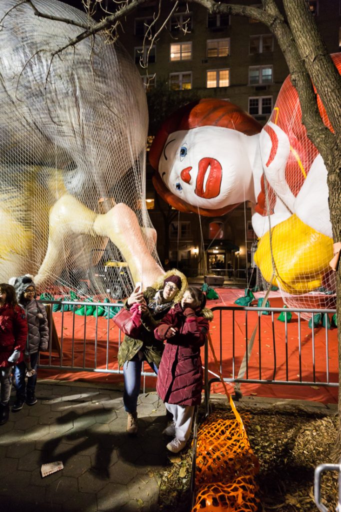 Selfie in front of balloon being inflated at the NYC Thanksgiving Parade Inflation Celebration