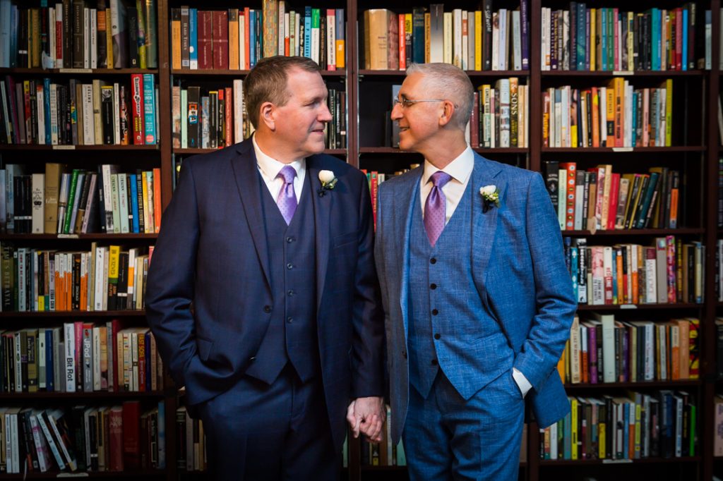 Two grooms at a Housing Works Bookstore Cafe wedding
