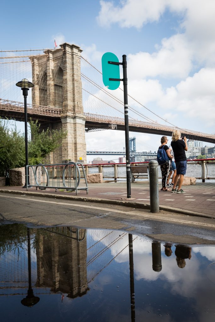 Tourists and Brooklyn Bridge for an article on City Hall wedding portrait locations