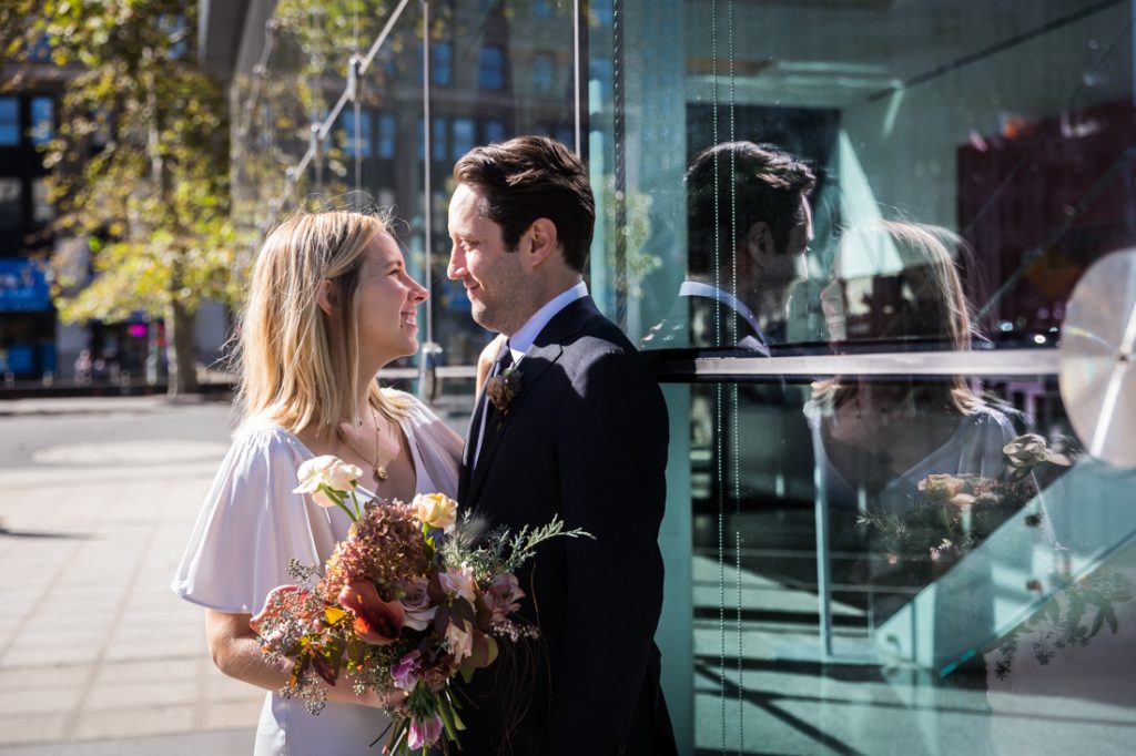 Couple at the US Court of International Trade for an article on City Hall wedding portrait locations