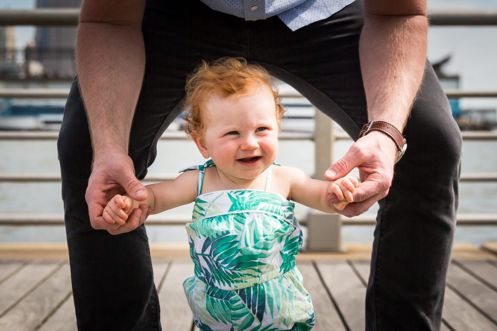 Smiling baby in a Hudson River Park Family Portrait