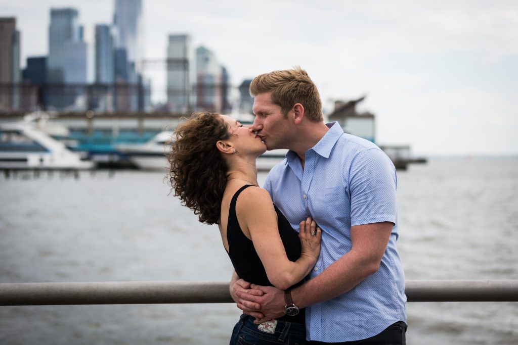 Kissing couple in a Hudson River Park Family Portrait