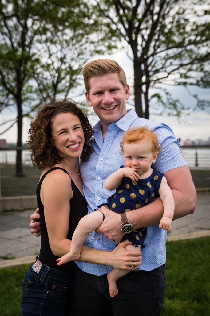 Smiling family in a Hudson River Park Family Portrait