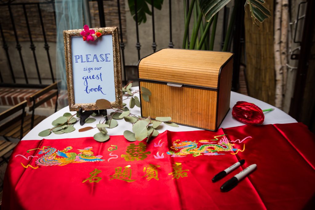 Chinese fabric guest book for an article on the pros and cons of a restaurant wedding