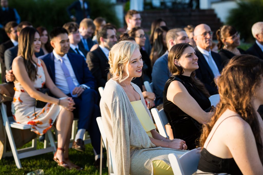 Guests at a wedding ceremony at a Larchmont Shore Club wedding
