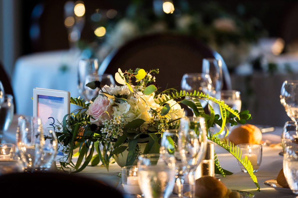 Floral centerpieces at a Larchmont Shore Club wedding
