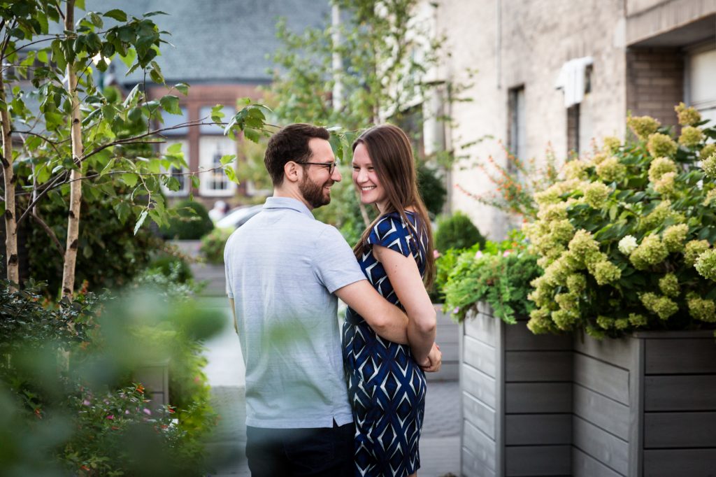 Couple posing for engagement portrait before ketubah signing