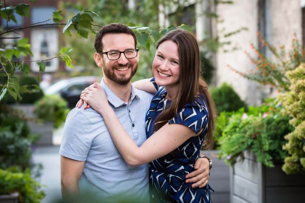 Couple posing for engagement portrait before ketubah signing