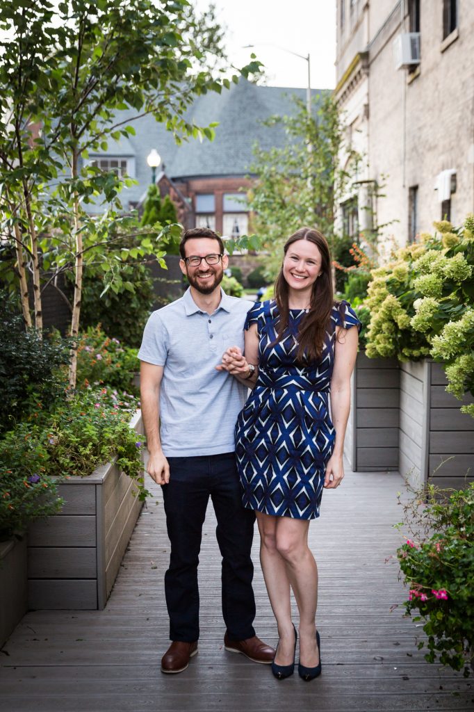 Couple posing for engagement portrait before ketubah signing