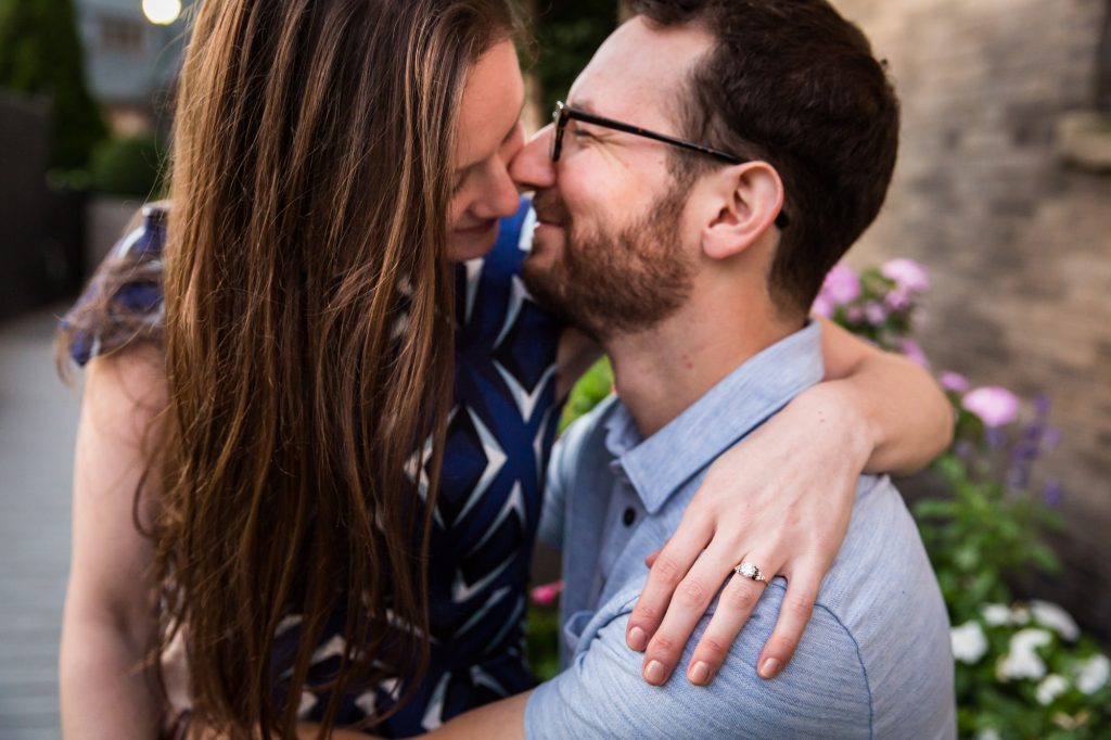 Couple posing for engagement portrait before ketubah signing