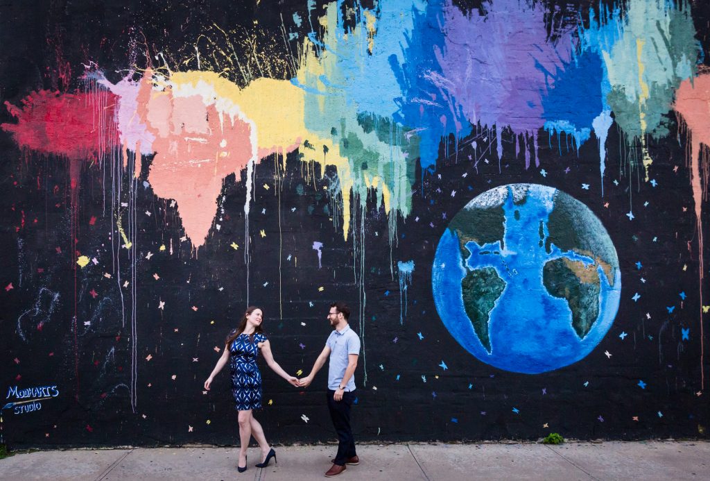 Couple posing for engagement portrait before ketubah signing