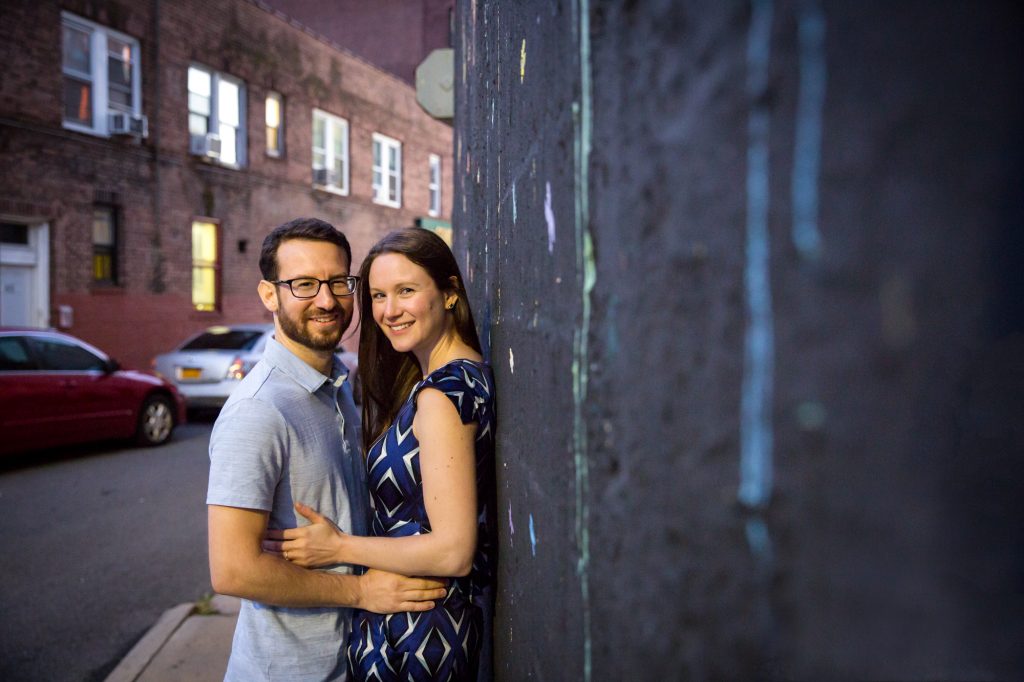 Couple posing for engagement portrait before ketubah signing