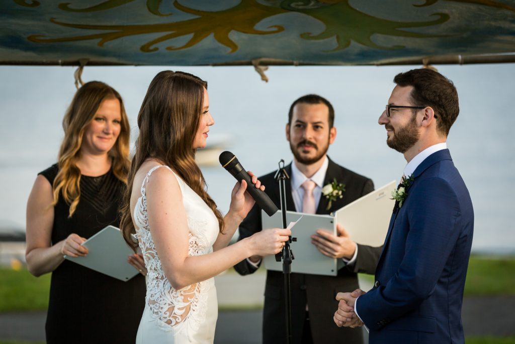 Bride and groom exchanging vows at wedding ceremony