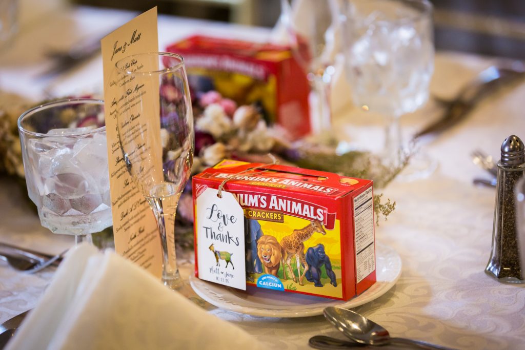 Place setting with box of animal crackers at a Westbury Manor wedding