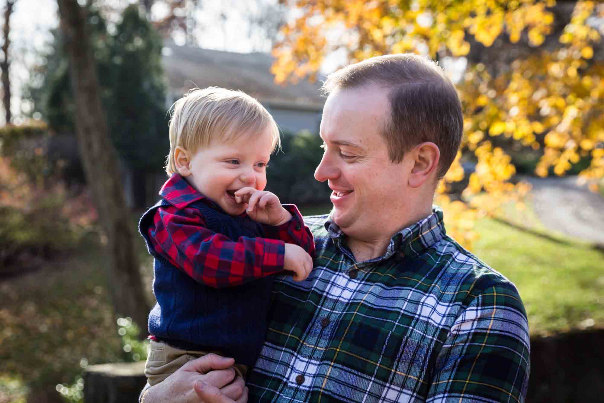 Father and son for article on how to get your kids to look into the camera