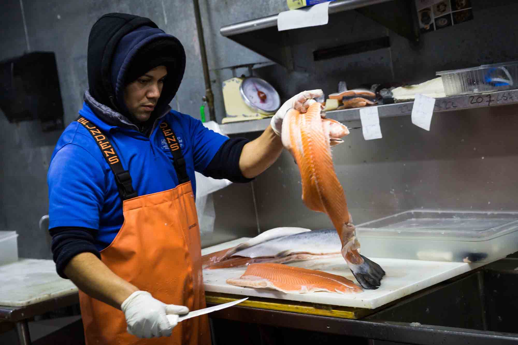 Salmon being cut for an article on website photography tips