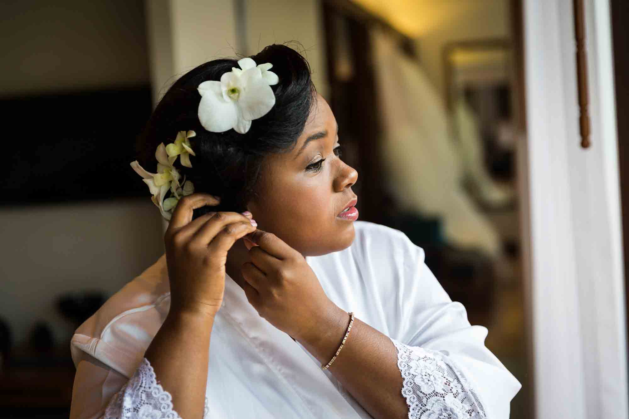 Bride with flowers in her hair for an article on destination wedding photography tips 