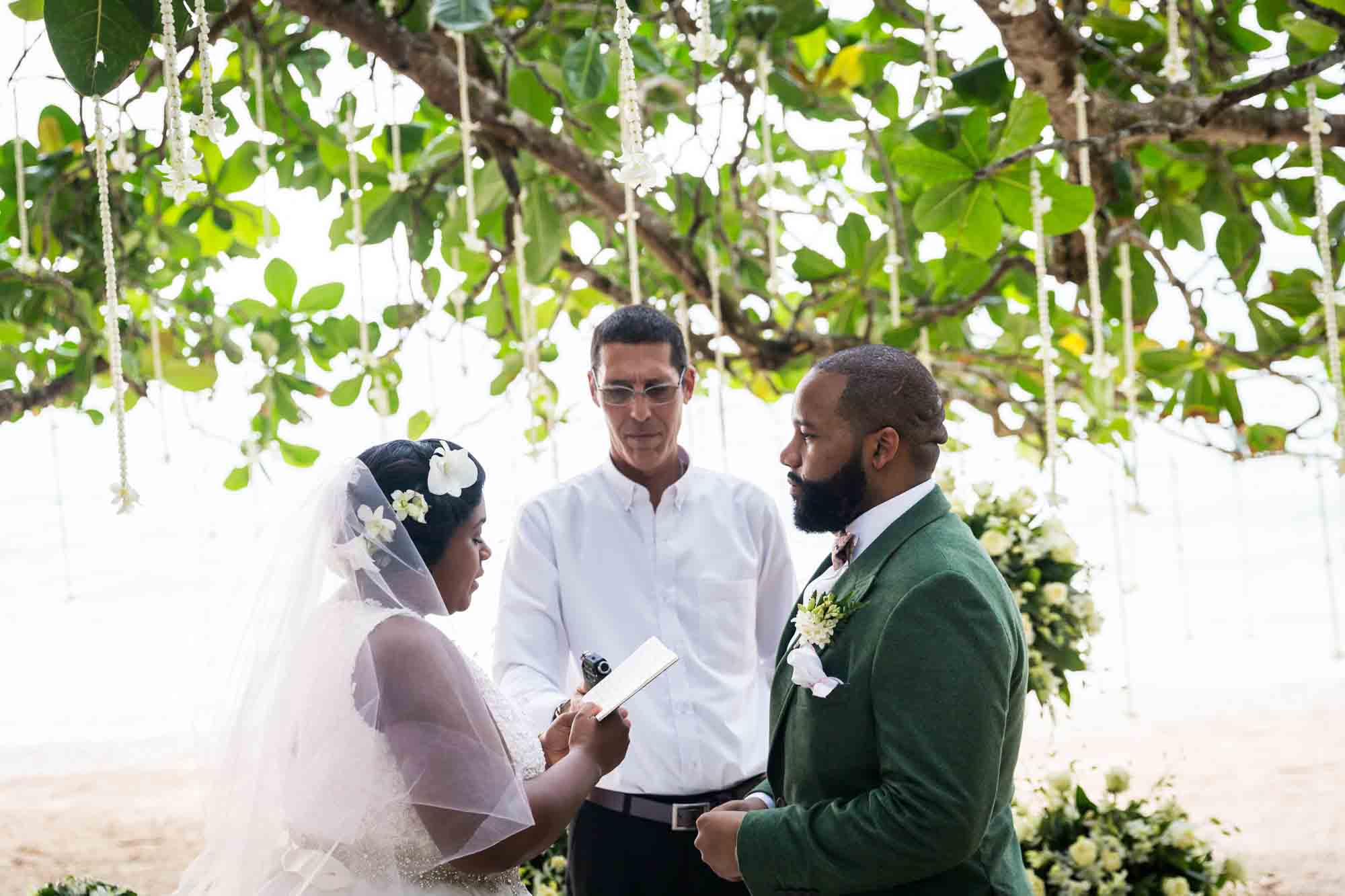 Bride and groom at altar for an article on destination wedding photography tips