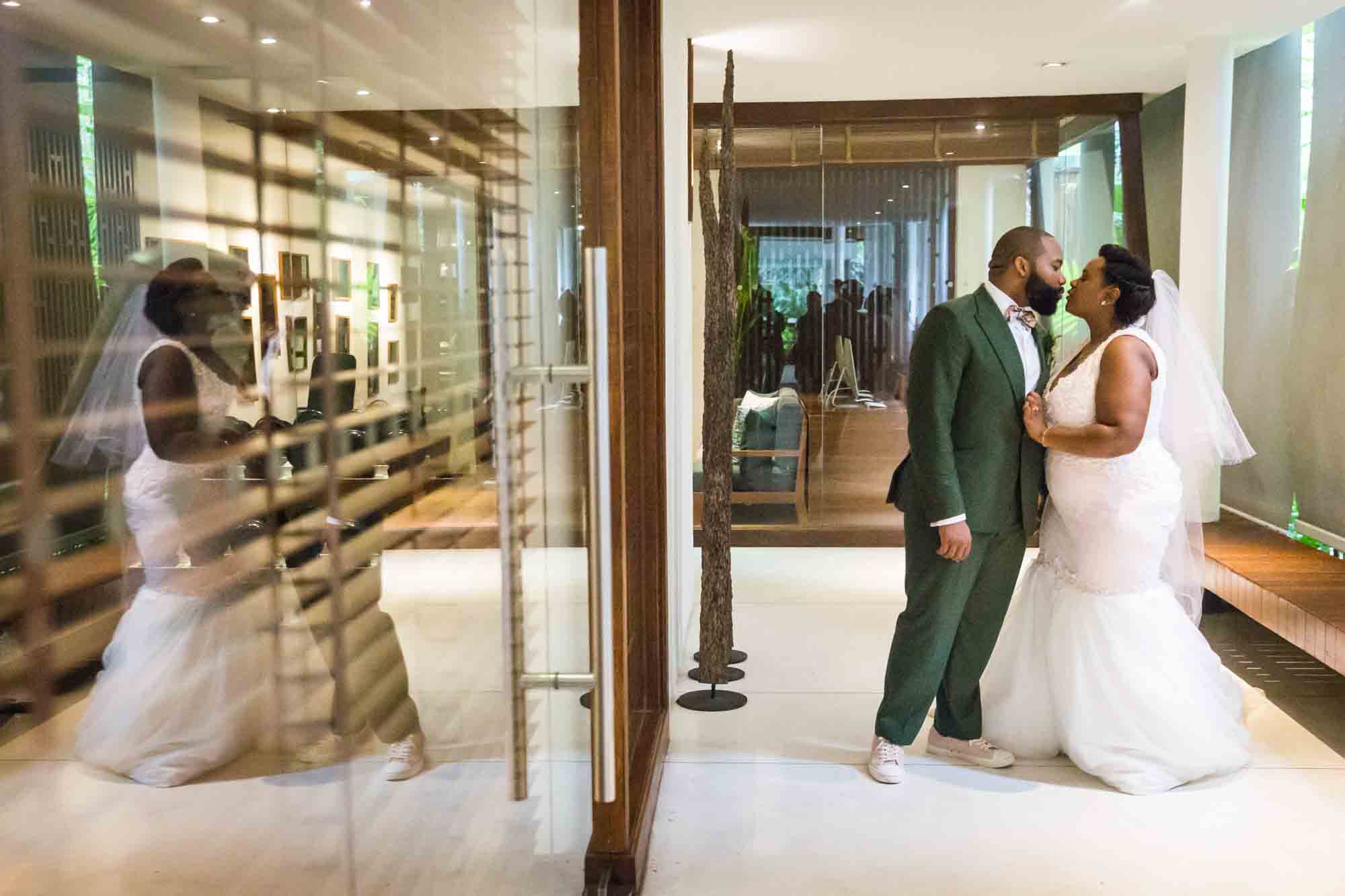 Bride and groom kissing for an article on destination wedding photography tips