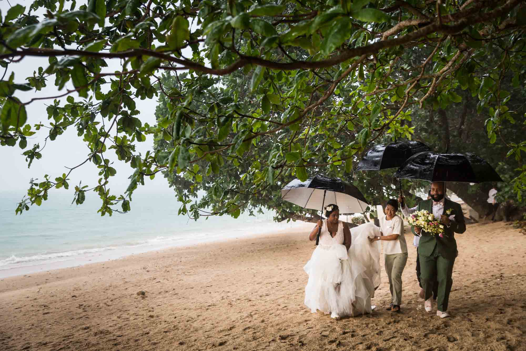 Bride and groom on a Thailand beach for an article on destination wedding planning tips